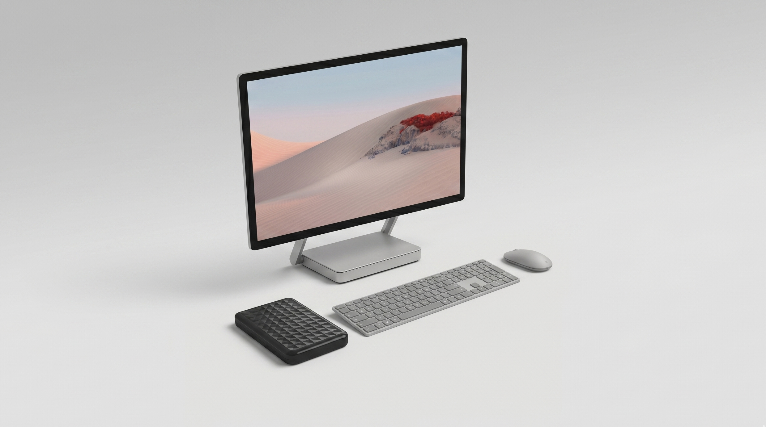 ModusTech 1TB portable external hard drive on a desk next to a laptop